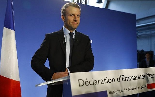 Former French Economy Minister Emmanuel Macron looks on prior to a press conference on November 16, 2016 in Bobigny, near Paris. (AFP PHOTO / PATRICK KOVARIK)