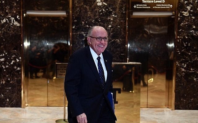Former New York City mayor Rudy Giuliani leaves the Trump Tower after meetings with US President-elect Donald Trump in New York, November 16, 2016. (AFP PHOTO / Jewel SAMAD) Former New York City mayor Rudy Giuliani leaves the Trump Tower after meetings with US President-elect Donald Trump in New York, November 16, 2016. (AFP PHOTO / Jewel SAMAD)