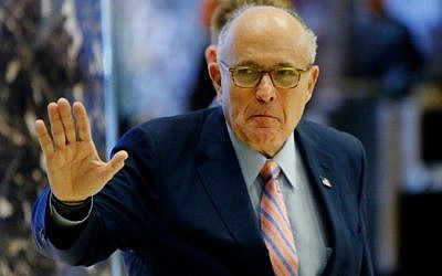 Former New York City mayor Rudy Giuliani arrives at the Trump Tower for meetings with US President-elect Donald Trump, in New York on November 17, 2016. (AFP Photo/Eduardo Munoz Alvarez)