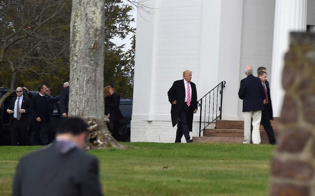 US President-elect Donald Trump arrives at the Lamington Presbyterian Church in Bedminster, New Jersey November 20, 2016 (AFP PHOTO / DON EMMERT)