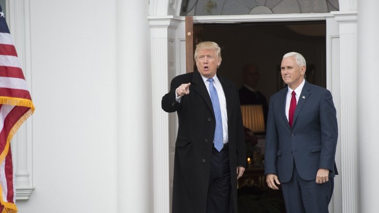 President-elect Donald Trump and Vice President Elect Mike Pence arrive for a day of meetings at the clubhouse of Trump National Golf Club November 20, 2016 in Bedminster, NJ. (AFP PHOTO / DON EMMERT) President-elect Donald Trump and Vice President Elect Mike Pence arrive for a day of meetings at the clubhouse of Trump National Golf Club November 20, 2016 in Bedminster, NJ. (AFP PHOTO / DON EMMERT)