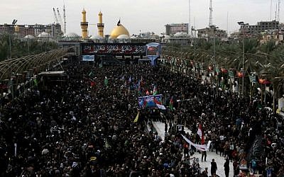 Illustrative: Shiite Muslim pilgrims gather outside the Imam Hussein shrine on the last day of the Arbaeen religious festival on November 21, 2016, in the holy Iraqi city of Karbala, 50 miles (80 kilometers) south of Baghdad. (AFP/Mohammed SAWAF)