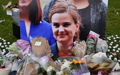 This photo taken on June 18, 2016 shows flowers and tributes laid in remembrance against a photograph of slain Labour MP Jo Cox in Parliament Square, central London, June 18, 2016. (AFP Photo/Ben Stansall) This photo taken on June 18, 2016 shows flowers and tributes laid in remembrance against a photograph of slain Labour MP Jo Cox in Parliament Square, central London, June 18, 2016. (AFP Photo/Ben Stansall)