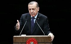Turkish President Recep Tayyip Erdogan addresses a speech to  teachers during a ceremony marking Teachers' Day, at Bestepe People's Congress and Culture Center in the Presidential Complex in Ankara, November 24, 2016. (AFP/ADEM ALTAN)