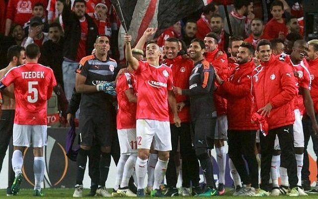 Hapoel Beesheba's players celebrate after winning the UEFA Europa League group K football match against Italy's Inter Milan at the Turner Stadium in the southern city of Beersheba, November 24, 2016. (AFP/Gil Cohen-Magen) Hapoel Beesheba's players celebrate after winning the UEFA Europa League group K football match against Italy's Inter Milan at the Turner Stadium in the southern city of Beersheba, November 24, 2016. (AFP/Gil Cohen-Magen)