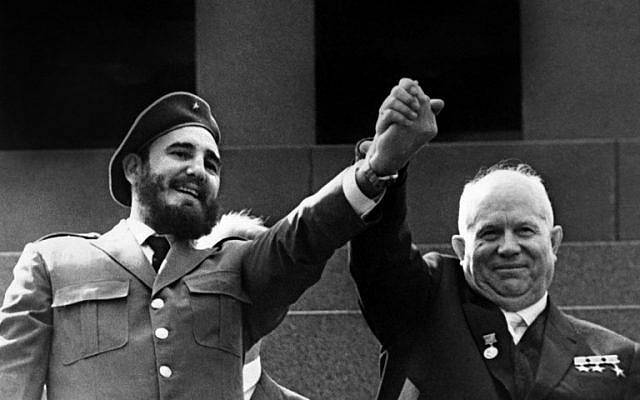 This May 1963 photo shows Cuban President Fidel Castro (L) clasping hands with Soviet leader Nikita Khrushchev during a four-week official visit to Moscow. (AFP PHOTO/TASS)