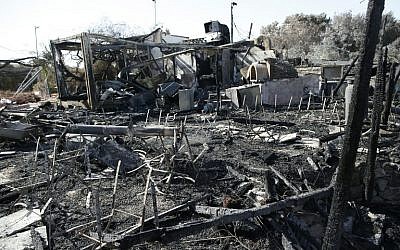 A picture shows the remains of the popular Nataf restaurant Rama's Kitchen on November 26, 2016, a day after it was burned down in a forest fire. (AFP Photo/Ahmad Gharabli)