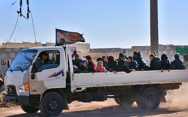 Displaced Syrian families arrive at a makeshit camp in the government-held district of Jibreen in Aleppo, November 27, 2016. (AFP/GEORGE OURFALIAN)