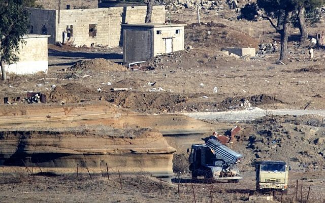 A picture taken from the Golan Heights shows a loaded missile launcher used by members of an armed group in the Syrian side of the Golan Heights on November 28, 2016. (AFP/ JACK GUEZ) A picture taken from the Golan Heights shows a loaded missile launcher used by members of an armed group in the Syrian side of the Golan Heights on November 28, 2016. (AFP/ JACK GUEZ)
