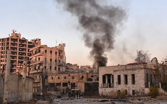 Smoke billows in Aleppo's Bustan al-Basha neighborhood on November 28, 2016, during Syrian pro-government forces assault to retake the entire northern city from rebel fighters. (AFP PHOTO/GEORGE OURFALIAN) Smoke billows in Aleppo's Bustan al-Basha neighborhood on November 28, 2016, during Syrian pro-government forces assault to retake the entire northern city from rebel fighters. (AFP PHOTO/GEORGE OURFALIAN)