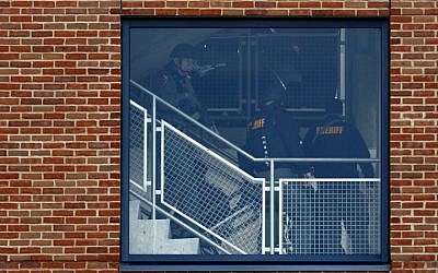 Law enforcement officials are seen searching inside of a parking garage on the campus of Ohio State University as they respond to an active shooting in Columbus, Ohio, November 28, 2016. (AFP PHOTO / Paul Vernon) Law enforcement officials are seen searching inside of a parking garage on the campus of The Ohio State University as they respond to an active shooting in Columbus, Ohio, November 28, 2016. (AFP PHOTO / Paul Vernon)