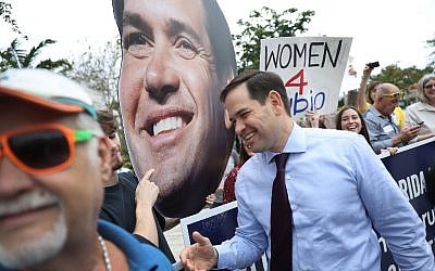 Florida Senator Marco Rubio (R) is greeted as he visits an early voting center to cast his general election ballot on October 31, 2016 in Miami, Florida. (Joe Raedle/Getty Images/AFP) Florida Senator Marco Rubio (R) is greeted as he visits an early voting center to cast his general election ballot on October 31, 2016 in Miami, Florida. (Joe Raedle/Getty Images/AFP)