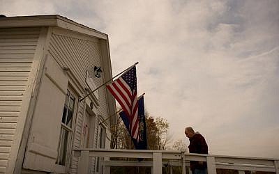 Voters enter the Simpson Voting House, established in 1891, to vote in the presidential election on November 8, 2016 in New Alexandria, Pennsylvania. (Jeff Swensen/Getty Images/AFP)