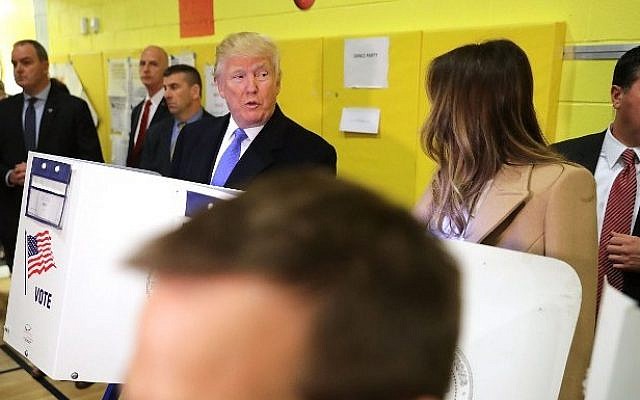 Surrounded by U.S. Secret Service agents, Republican presidential nominee Donald Trump and his wife Melania Trump cast their votes on Election Day at PS 59 November 8, 2016 in New York City. (Chip Somodevilla/Getty Images/AFP) Surrounded by U.S. Secret Service agents, Republican presidential nominee Donald Trump and his wife Melania Trump cast their votes on Election Day at PS 59 November 8, 2016 in New York City. (Chip Somodevilla/Getty Images/AFP)