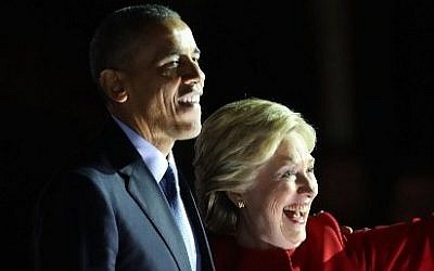 Democratic presidential nominee former Secretary of State Hillary Clinton stands with Barack Obama at an election eve rally on November 7, 2016 in Philadelphia, Pennsylvania. (Spencer Platt/Getty Images/AFP)