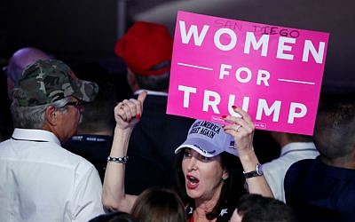 An attendee holds up a sign in support of Republican presidential nominee Donald Trump that reads "Women For Trump" during the election night event at the New York Hilton Midtown on November 8, 2016 in New York City.  (Mark Wilson/Getty Images/AFP)
