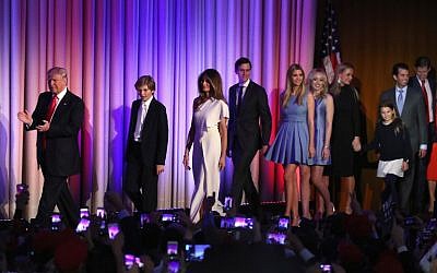 Republican president-elect Donald Trump walks on stage along with, left to right, his son, Barron Trump, wife Melania Trump, son-in-law Jared Kushner, daughters Ivanka Trump, Tiffany Trump, and Vanessa Trump, and sons  Donald Trump Jr., and Eric Trump during his election night event at the New York Hilton Midtown in the early morning hours of November 9, 2016, New York City. (Mark Wilson/Getty Images/AFP)