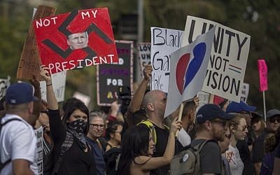 Protesters march in reaction to the upset election of Republican Donald Trump over Democrat Hillary Clinton in the race for President of the United States on November 12, 2016 in Los Angeles, California. (David McNew/Getty Images/AFP)