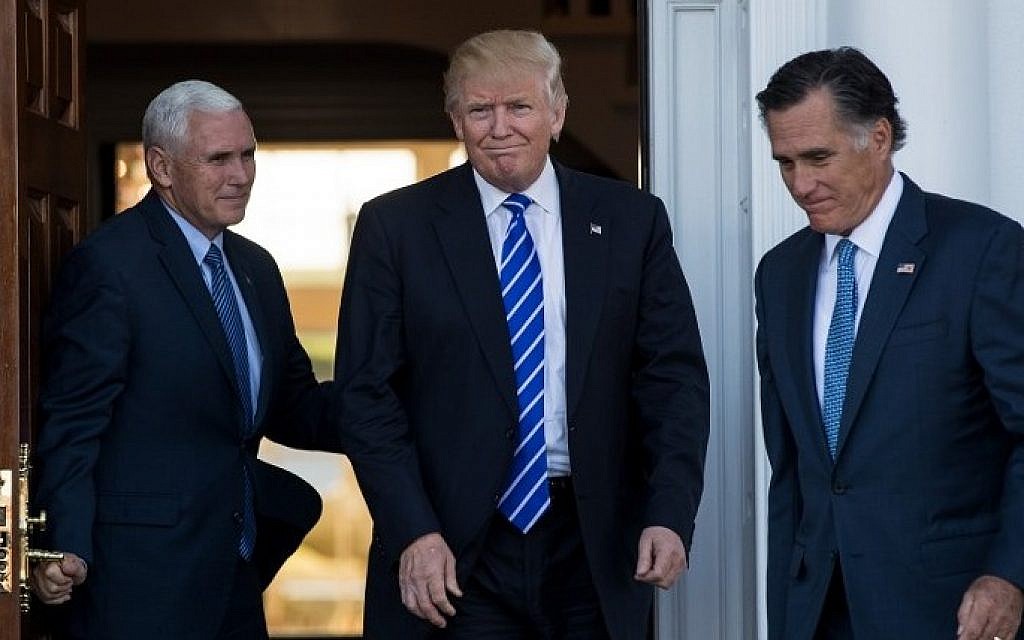 Vice president-elect Mike Pence, left, President-elect Donald Trump and Mitt Romney, right, leave the clubhouse after their meeting at Trump International Golf Club, Bedminster Township, New Jersey, November 19, 2016. (Drew Angerer/Getty Images/AFP)