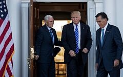 (L to R) Vice president-elect Mike Pence, President-elect Donald Trump and Mitt Romney leave the clubhouse after their meeting at Trump International Golf Club, November 19, 2016 in Bedminster Township, New Jersey.  (Drew Angerer/Getty Images/AFP)