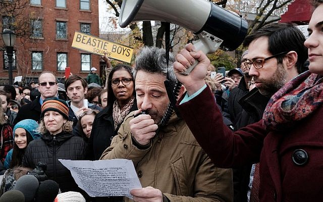 Beastie Boys member Adam Horovitz speaks at a anti-hate rally at a Brooklyn park named in memory of Beastie Boys band member Adam Yauch after it was defaced with swastikas on November 20, 2016 in New York City. (Spencer Platt/Getty Images/AFP)
