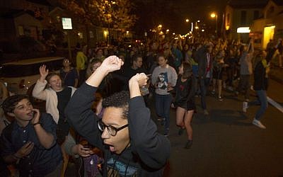 Protesters against President-elect Donald Trump march down a street east of the University of Oregon campus in Eugene, Ore., Wednesday, November 9, 2016. (Chris Pietsch/The Register-Guard via AP)