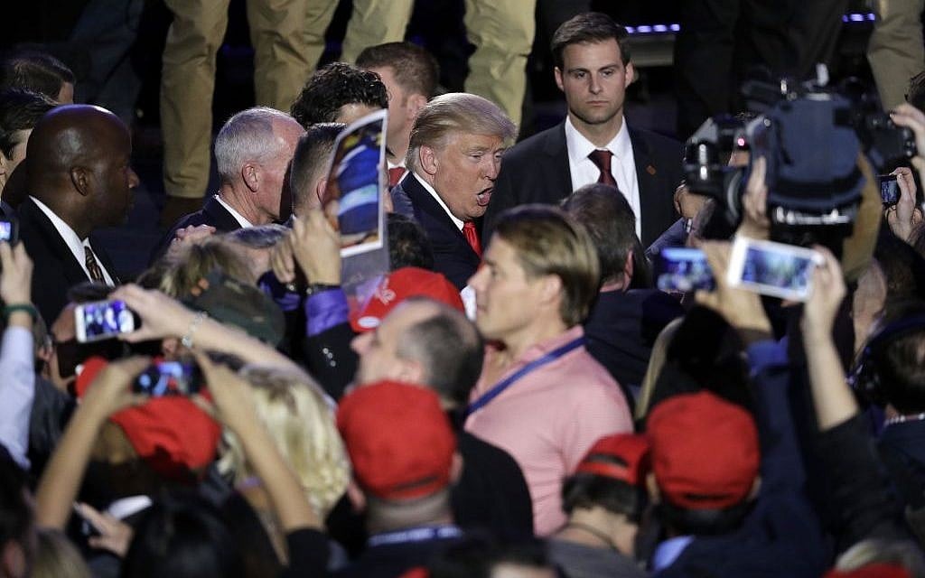 President-elect Donald Trump shakes hands with supporters after giving his acceptance speech during his election night rally, Wednesday, November 9, 2016, in New York. (AP Photo/John Locher) President-elect Donald Trump shakes hands with supporters after giving his acceptance speech during his election night rally, Wednesday, November 9, 2016, in New York. (AP Photo/John Locher)