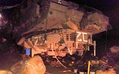 Sgt. Ido Ben-Ari's tank, which flipped during an exercise in the Golan Heights, killing him and wounding three other soldiers on November 24, 2016. (Twitter) Sgt. Ido Ben-Ari's tank, which flipped during an exercise in the Golan Heights, killing him and wounding three other soldiers on November 24, 2016. (Twitter)