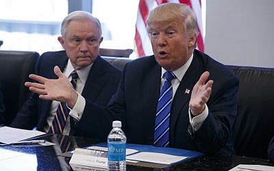 Alabama Sen. Jeff Sessions, left, looks on as Republican presidential candidate Donald Trump speaks during a national security meeting with advisors at Trump Tower, Friday, Oct. 7, 2016 (Evan Vucci/AP) Alabama Sen. Jeff Sessions, left, looks on as Republican presidential candidate Donald Trump speaks during a national security meeting with advisors at Trump Tower, Friday, Oct. 7, 2016 (Evan Vucci/AP)