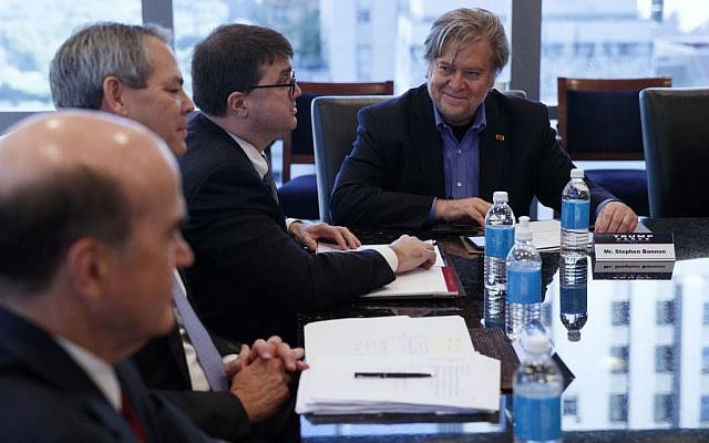 Steve Bannon, campaign CEO for President-elect Donald Trump's presidential campaign, right, looks on during a national security meeting with advisors at Trump Tower, Friday, Oct. 7, 2016 (AP Photo/ Evan Vucci)