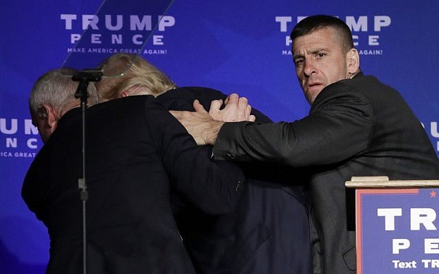 Secret Service agents pull Republican presidential candidate Donald Trump of the stage at a rally Saturday, Nov. 5, 2016, in Reno, Nev. (AP Photo/John Locher) Secret Service agents pull Republican presidential candidate Donald Trump of the stage at a rally Saturday, Nov. 5, 2016, in Reno, Nev. (AP Photo/John Locher)