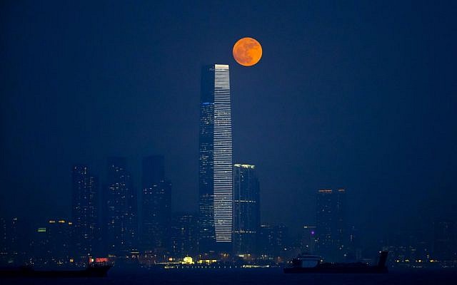 The brightest moon in almost 69 years rises over Victoria Harbour in Hong Kong, Monday, Nov. 14, 2016. The phenomenon is known as the supermoon. The tall building is the International Commerce Centre. (Kin Cheung/AP Photo) The brightest moon in almost 69 years rises over Victoria Harbour in Hong Kong, Monday, Nov. 14, 2016. The phenomenon is known as the supermoon. The tall building is the International Commerce Centre. (Kin Cheung/AP Photo)