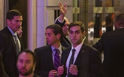 Vice President-elect Mike Pence, top center, leaves the Richard Rodgers Theatre after a performance of "Hamilton," in New York, Friday, Nov. 18, 2016. (AP Photo/Andres Kudacki)