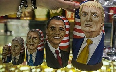 Traditional Russian wooden dolls called Matreska depict US presidents, from left, George H.W. Bush, Bill Clinton, George W. Bush, Barack Obama and US president-elect Donald Trump displayed in a shop in Moscow, Russia on Tuesday, Nov. 8, 2016. (AP Photo/Pavel Golovkin)