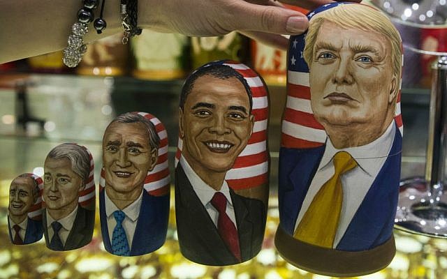 Traditional Russian wooden dolls called Matreska depict US presidents, from left, George H.W. Bush, Bill Clinton, George W. Bush, Barack Obama and US president-elect Donald Trump displayed in a shop in Moscow, Russia on Tuesday, Nov. 8, 2016. (AP Photo/Pavel Golovkin)