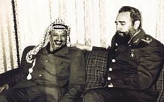 An undated file photograph of late Palestinian leader Yasser Arafat, left, and late Cuban Pesident Fidel Castro, made available by the Palestinian Authority in Gaza City of the Gaza Strip. (AP Photo/Palestinian Authority)