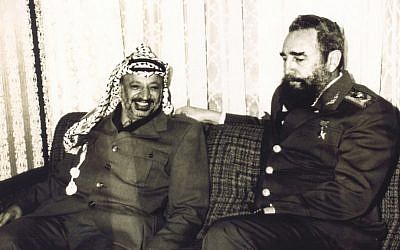 An undated file photograph of late Palestinian leader Yasser Arafat, left, and late Cuban Pesident Fidel Castro, made available by the Palestinian Authority in Gaza City of the Gaza Strip. (AP Photo/Palestinian Authority)
