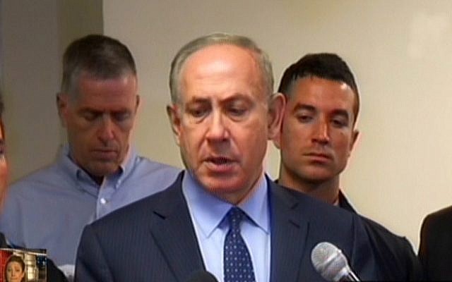 Prime Minister Benjamin Netanyahu addresses the media about raging wildfires on Thursday, November 24, 2016 (screen capture: Channel 2)