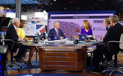 CBS News Contributor Bob Schieffer, from left, CBS This Morning co-host Gayle King, CBS Evening News anchor Scott Pelley, CBS This Morning co-host Norah O'Donnell, Face the Nation anchor John Dickerson and CBS This Morning co-host Charlie Rose host 2016 election night coverage on Nov. 8, 2016, at the CBS Broadcast Center in New York. (Michele Crowe/CBS via AP)