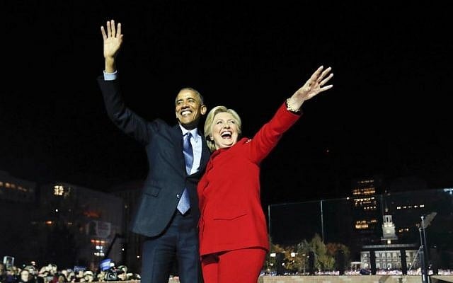 President Barack Obama waves on stage with Democratic presidential candidate Hillary Clinton during a rally at Independence Hall in Philadelphia, Monday, November 7, 2016. (AP Photo/Pablo Martinez Monsivais)