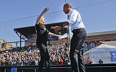 Chelsea Clinton, left, prepares to embrace US President Barack Obama at the University of Michigan in Ann Arbor, Michigan, Monday, November 7, 2016, during a campaign rally for Chelsea's mother, Democratic presidential candidate Hillary Clinton. (AP /Pablo Martinez Monsivais)