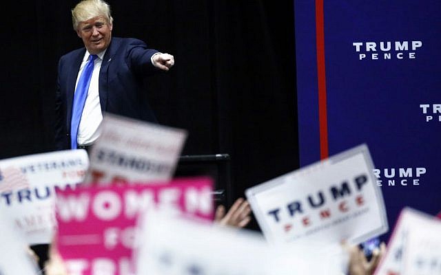 Republican presidential candidate Donald Trump prepares to leave after speaking at a campaign rally in Sioux City, Iowa, Sunday, Nov. 6, 2016. (AP Photo/ Brennan Linsley)