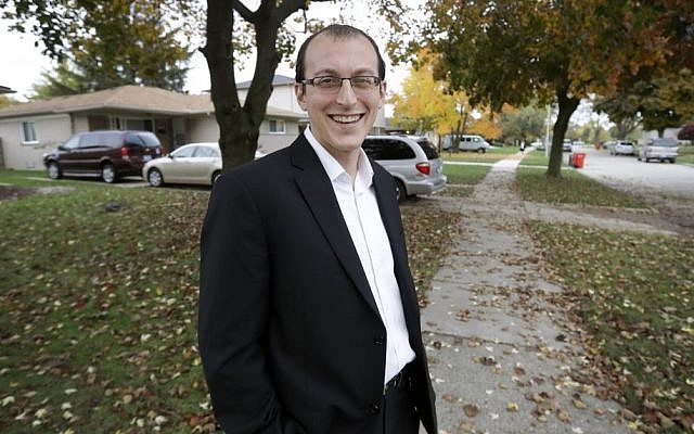 In this photo taken Nov. 3, 2016, Moshe Sherizen, an undecided voter, is shown outside his home in Southfield, Mich. (AP/Carlos Osorio)