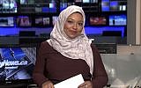 This image made from a video provided by CityNews shows Ginella Massa, a Toronto TV reporter who is believed to be Canada’s first anchor to don a Muslim head scarf at one of the city's major news broadcasters. (CityNews via AP)