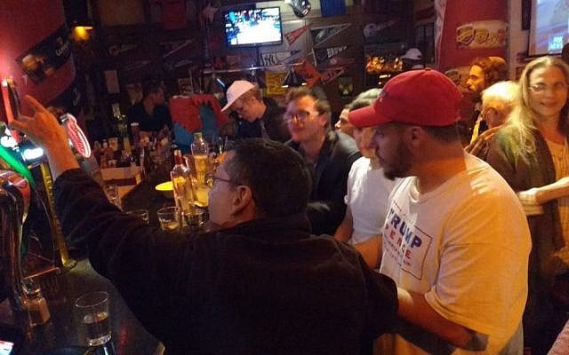 Trump supporters at Mike's Place bar in Jerusalem on November 9, 2016. (Melanie Lidman/ Times of Israel)