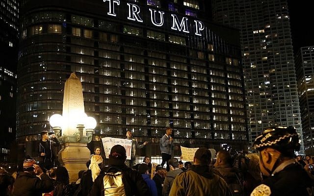 People gather in downtown Chicago as they protest the election of President-elect Donald Trump, Thursday, Nov. 10, 2016 (AP Photo/Nam Y. Huh) People gather in downtown Chicago as they protest the election of President-elect Donald Trump, Thursday, Nov. 10, 2016 (AP Photo/Nam Y. Huh)