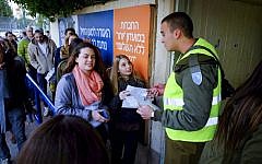 A group of new recruits arrive at the army's induction center outside Tel Aviv on January 11, 2015. (Chen Leopold/Flash90)