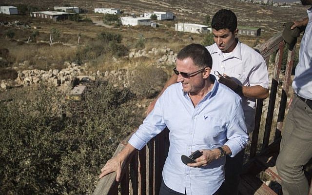 Knesset speaker Yuli Edelstein touring the Amona outpost on July 28, 2016. Hadas Parush/FLASH90) Knesset speaker Yuli Edelstein touring the Amona outpost on July 28, 2016. Hadas Parush/FLASH90)