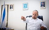 Jewish Home chair Naftali Bennett in his office at the Ministry of Education in Jerusalem, August 28, 2016. (Miriam Alster/Flash90)