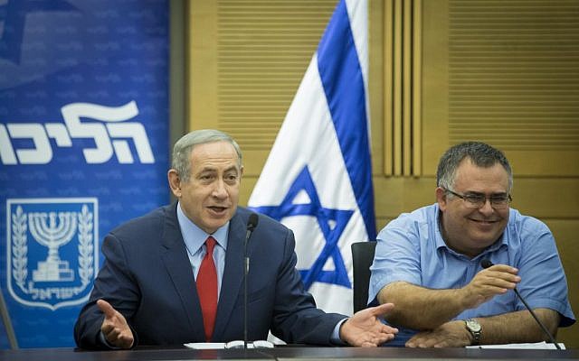 Prime Minister Benjamin Netanyahu (left) and MK David Bitan attend a Likud faction meeting in the Knesset, October 31, 2016. (Miriam Alster/FLASH90) Prime Minister Benjamin Netanyahu (left) and MK David Bitan attend a Likud faction meeting in the Knesset, October 31, 2016. (Miriam Alster/FLASH90)
